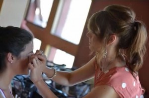 Alicia working on a brides makeup